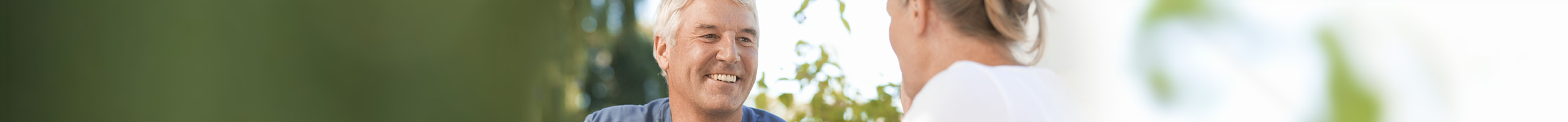 man with dental implants smiling