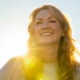smiling woman with dental implants
