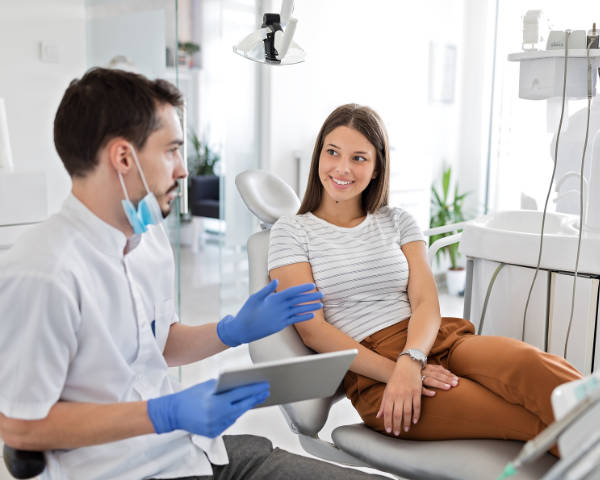 dentist providing a dental implant consultation